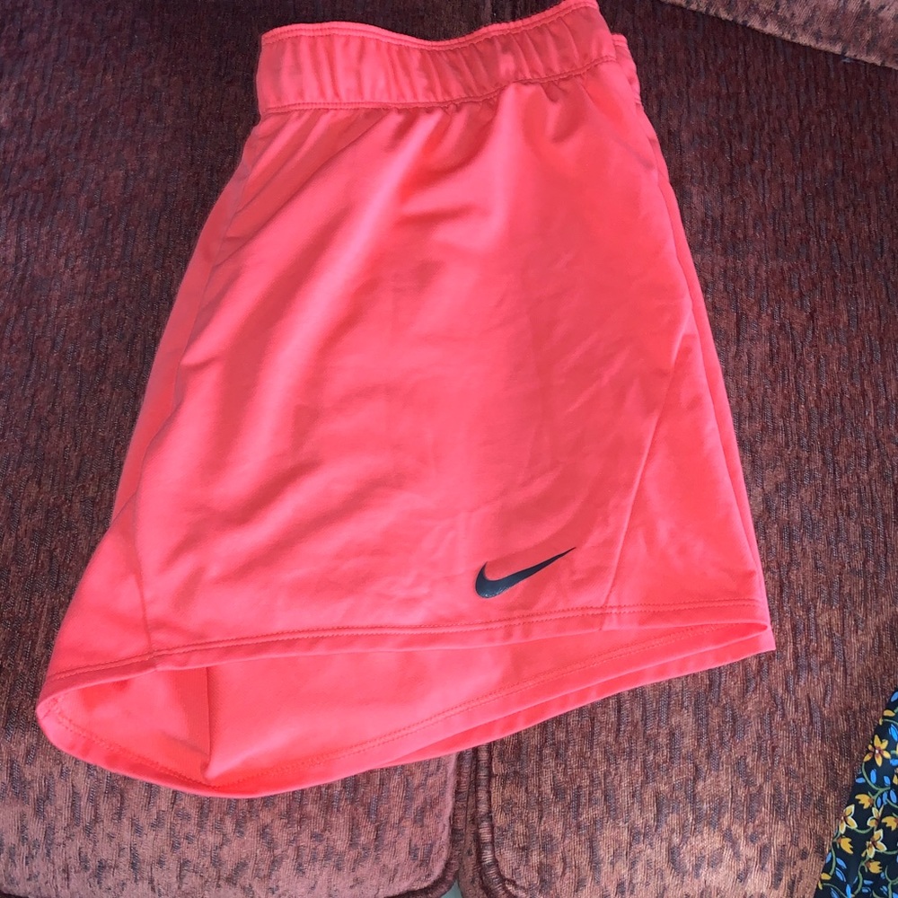 Coral Nike shorts